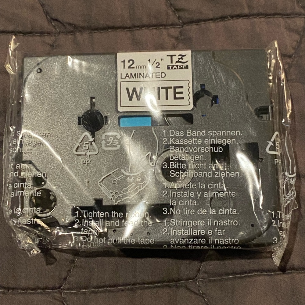 Brother Electronic Label Tape Black‎ Print on White Tape Sealed